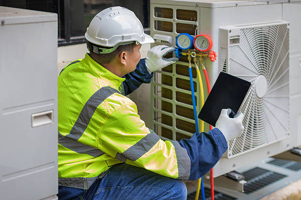 Professional Emergency Ac Repair technician working in Sound Beach, NY